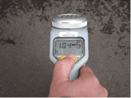 CAT4 display during the power-up sequence, reading 1.04-S.